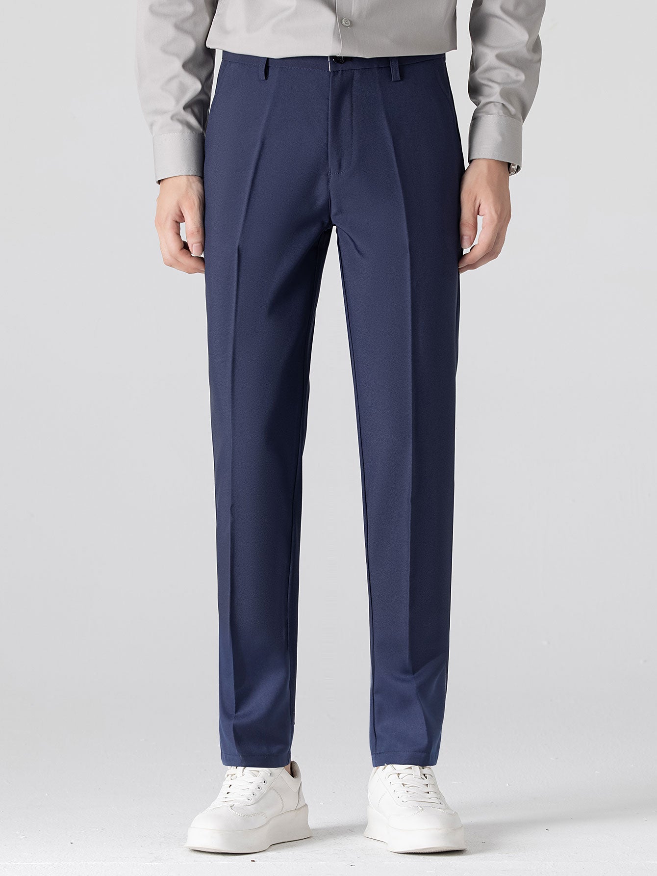 Polo de jacquard en contraste y pantalones ajustados de corte cónico