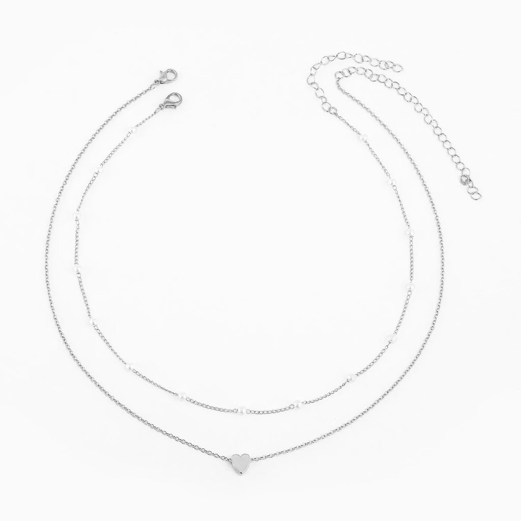 Collares multicapas con colgante de corazón y cruz de perlas