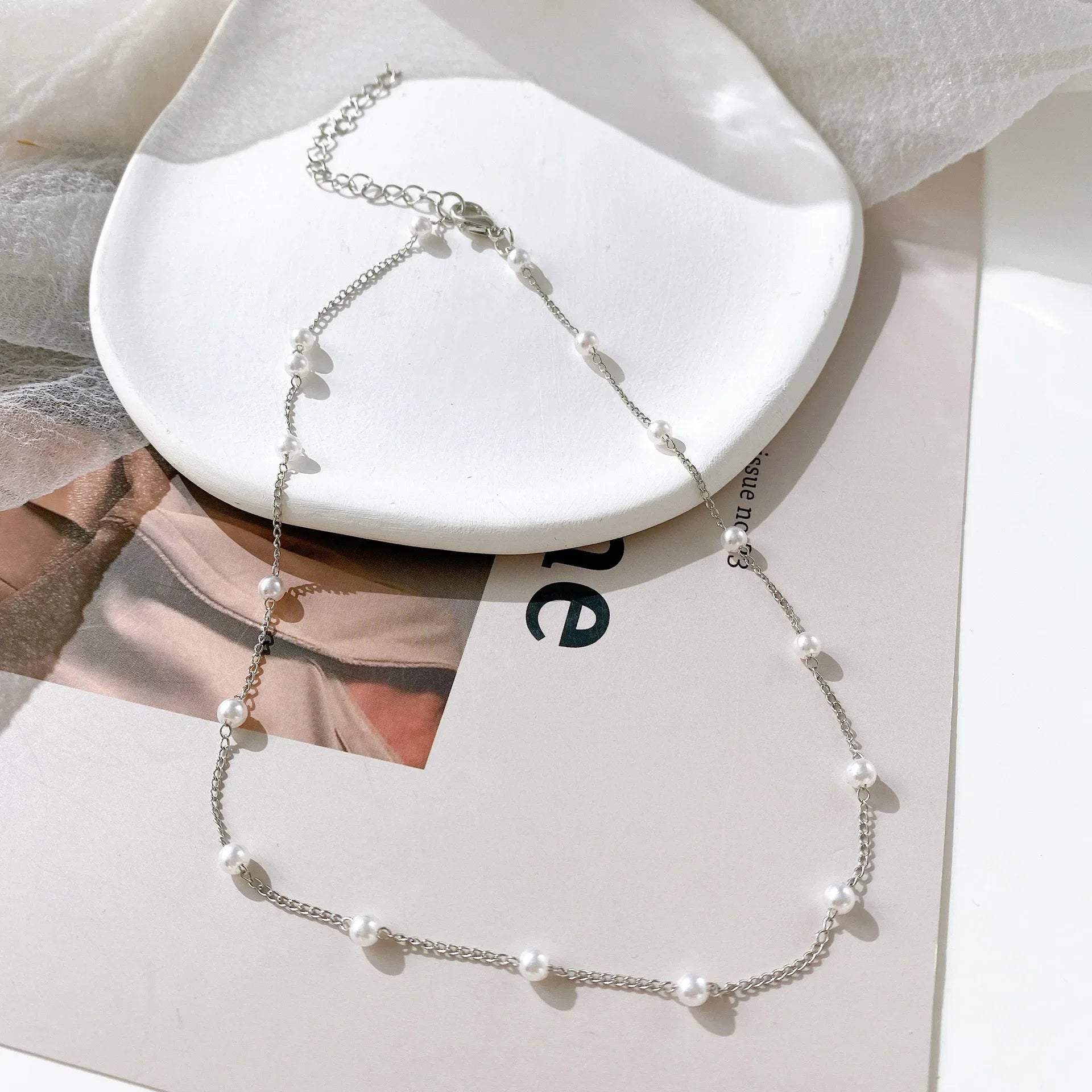 Collares multicapas con colgante de corazón y cruz de perlas